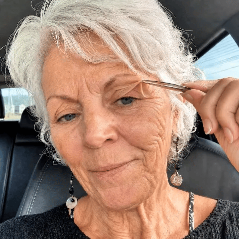 Woman showing firmer-looking skin around the eye area